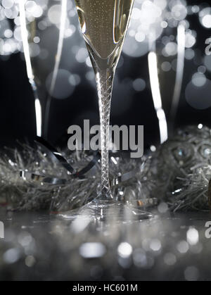 Three luxury champagne glasses on a black background Stock Photo