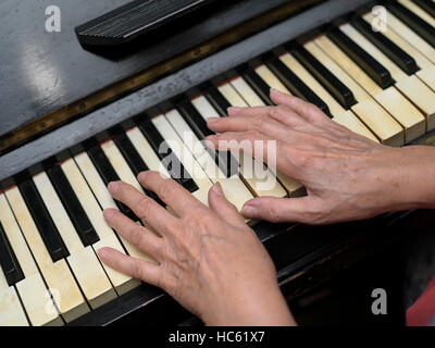 Playing On Retro Piano Stock Photo