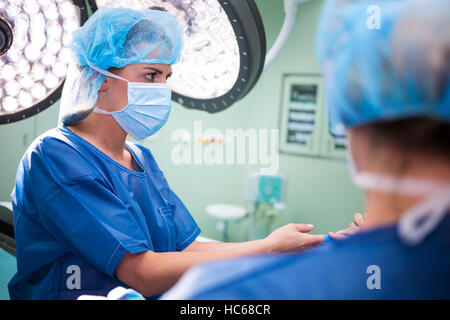 Female surgeon in operation room Stock Photo