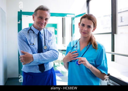 Portrait of doctor and nurse smiling at camera Stock Photo