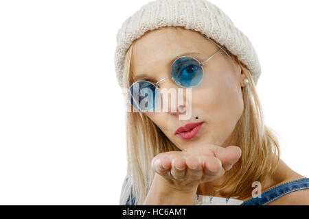 pretty young blonde woman with blue sunglasses sending kisses Stock Photo
