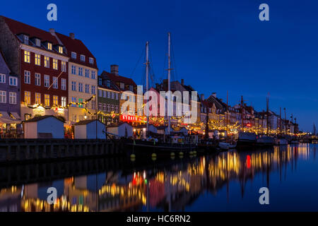 Christmas decoration along Nyhavn canal, Copenhagen, Denmark Stock Photo