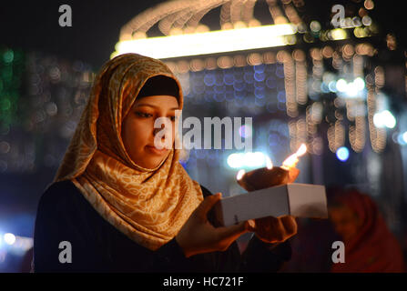 Lahore, Pakistan. 07th Dec, 2016. Pakistani Muslim devotees gathered to attend the 393rd death anniversary of the saint Mir Mohammed Muayyinul Islam popularly known as Sain Mian Mir. The saint was equally popular among the Muslim and Sikh religions, as Mian Mir went to Amritsar in December 1588 to lay the foundation stone of Sikhs holiest site, the Golden Temple, which is commonly known as Sri Harminder Sahib. Credit:  Rana Sajid Hussain/Pacific Press/Alamy Live News Stock Photo