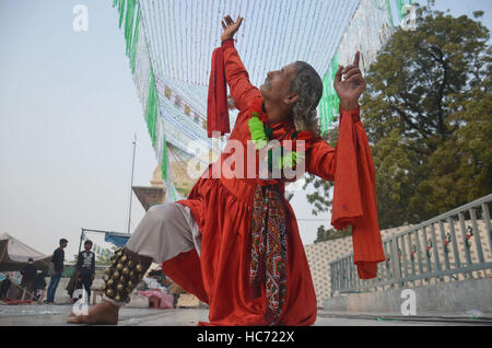 Lahore, Pakistan. 07th Dec, 2016. Pakistani Muslim devotees gathered to attend the 393rd death anniversary of the saint Mir Mohammed Muayyinul Islam popularly known as Sain Mian Mir. The saint was equally popular among the Muslim and Sikh religions, as Mian Mir went to Amritsar in December 1588 to lay the foundation stone of Sikhs holiest site, the Golden Temple, which is commonly known as Sri Harminder Sahib. Credit:  Rana Sajid Hussain/Pacific Press/Alamy Live News Stock Photo