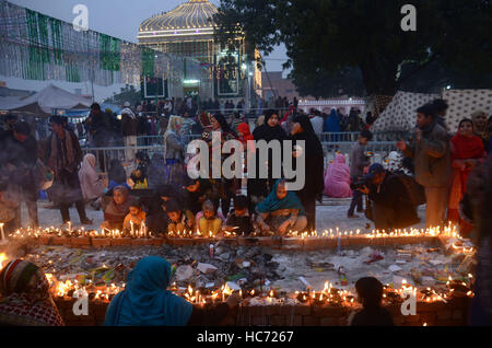 Lahore, Pakistan. 07th Dec, 2016. Pakistani Muslim devotees gathered to attend the 393rd death anniversary of the saint Mir Mohammed Muayyinul Islam popularly known as Sain Mian Mir. The saint was equally popular among the Muslim and Sikh religions, as Mian Mir went to Amritsar in December 1588 to lay the foundation stone of Sikhs holiest site, the Golden Temple, which is commonly known as Sri Harminder Sahib. Credit:  Rana Sajid Hussain/Pacific Press/Alamy Live News Stock Photo