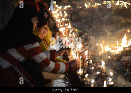 Lahore, Pakistan. 07th Dec, 2016. Pakistani Muslim devotees gathered to attend the 393rd death anniversary of the saint Mir Mohammed Muayyinul Islam popularly known as Sain Mian Mir. The saint was equally popular among the Muslim and Sikh religions, as Mian Mir went to Amritsar in December 1588 to lay the foundation stone of Sikhs holiest site, the Golden Temple, which is commonly known as Sri Harminder Sahib. Credit:  Rana Sajid Hussain/Pacific Press/Alamy Live News Stock Photo