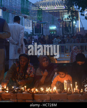 Lahore, Pakistan. 07th Dec, 2016. Pakistani Muslim devotees gathered to attend the 393rd death anniversary of the saint Mir Mohammed Muayyinul Islam popularly known as Sain Mian Mir. The saint was equally popular among the Muslim and Sikh religions, as Mian Mir went to Amritsar in December 1588 to lay the foundation stone of Sikhs holiest site, the Golden Temple, which is commonly known as Sri Harminder Sahib. Credit:  Rana Sajid Hussain/Pacific Press/Alamy Live News Stock Photo