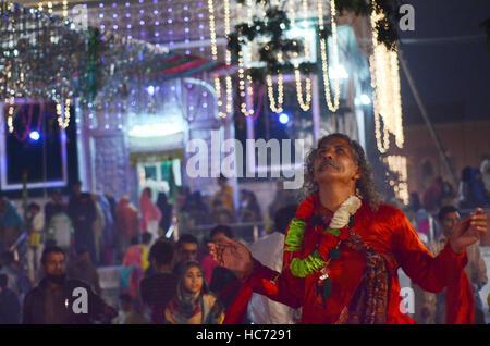 Lahore, Pakistan. 07th Dec, 2016. Pakistani Muslim devotees gathered to attend the 393rd death anniversary of the saint Mir Mohammed Muayyinul Islam popularly known as Sain Mian Mir. The saint was equally popular among the Muslim and Sikh religions, as Mian Mir went to Amritsar in December 1588 to lay the foundation stone of Sikhs holiest site, the Golden Temple, which is commonly known as Sri Harminder Sahib. Credit:  Rana Sajid Hussain/Pacific Press/Alamy Live News Stock Photo