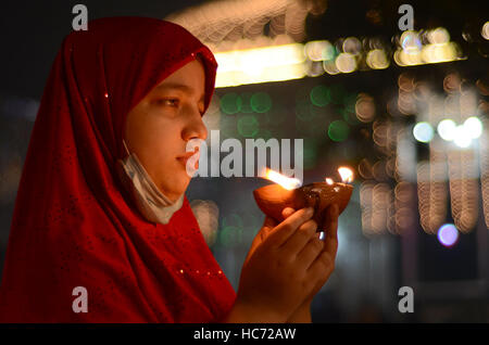 Lahore, Pakistan. 07th Dec, 2016. Pakistani Muslim devotees gathered to attend the 393rd death anniversary of the saint Mir Mohammed Muayyinul Islam popularly known as Sain Mian Mir. The saint was equally popular among the Muslim and Sikh religions, as Mian Mir went to Amritsar in December 1588 to lay the foundation stone of Sikhs holiest site, the Golden Temple, which is commonly known as Sri Harminder Sahib. Credit:  Rana Sajid Hussain/Pacific Press/Alamy Live News Stock Photo