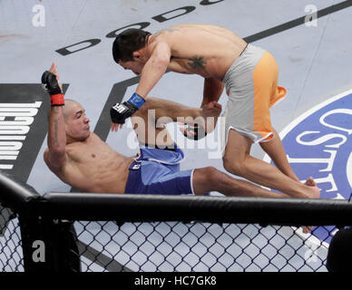 Diego Brandao, left, fights Dennis Bermudez at The Ultimate Fighter 14 Finale at the Palms in Las Vegas, Nevada on Saturday, December 3, 2011. Photo by Francis Specker Stock Photo