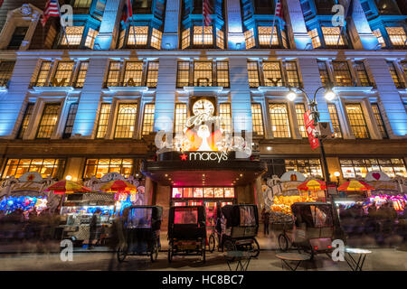 Macy's (Department Store) with Christmas lights and holiday window displays. Midtown Manhattan, New York CIty Stock Photo