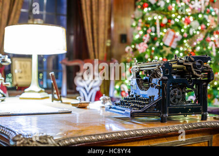 Retro Christmas interior with old typewriter Stock Photo