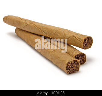 Three cigar stack macro closeup isolated cuban cigars gentle shadow Stock Photo
