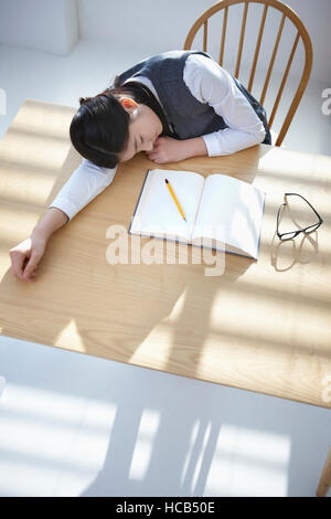 High angle view of tired middle school girl Stock Photo