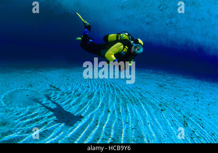 Scuba diver and shadow in the Gruener See Lake in Styria, Austria, Europe Stock Photo