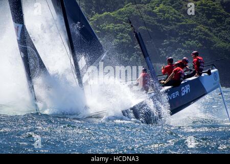 Sydney, Australia. 08th Dec, 2016. Land Rover BAR Academy (GBR), skippered by Neil Hunter (GBR) nosedives prior to capsizing on the waters of the Sydney Harbour in Australia. Credit:  Hugh Peterswald/Pacific Press/Alamy Live News Stock Photo