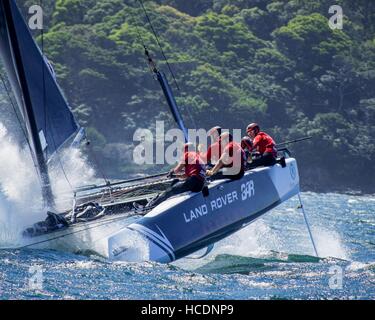 Sydney, Australia. 08th Dec, 2016. Land Rover BAR Academy (GBR), skippered by Neil Hunter (GBR) nosedives prior to capsizing on the waters of the Sydney Harbour in Australia. Credit:  Hugh Peterswald/Pacific Press/Alamy Live News Stock Photo