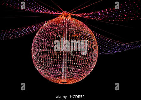 new year lighting ball hanging in the night Stock Photo