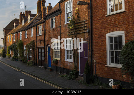 Row off Red-Brick terraced cottages  in Mill Street, Tewkesbury Stock Photo