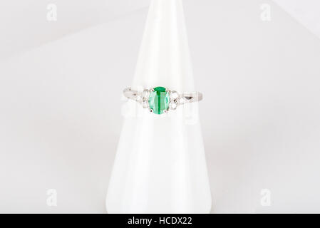 Diamond ring with gold and silver and precious stones. Shot standing up and from above. Stock Photo