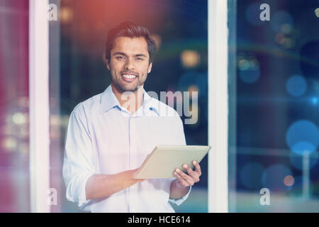 Businessman using digital tablet Stock Photo