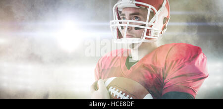 Composite image of american football player being ready for playing Stock Photo