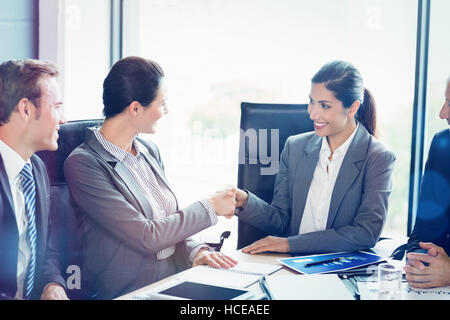 Businesspeople in conference room Stock Photo
