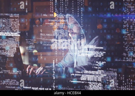 Man using laptop at night Stock Photo