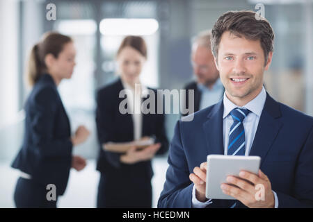 Businessman using digital tablet Stock Photo