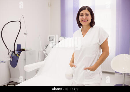 Portrait of dermatologist standing with hands in pockets Stock Photo