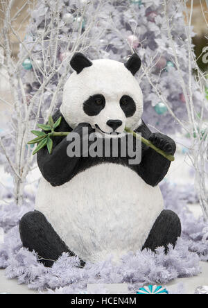 Christmas decoration Panda, Christmas presents on wooden table. Stock Photo
