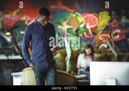Businessman using mobile phone Stock Photo