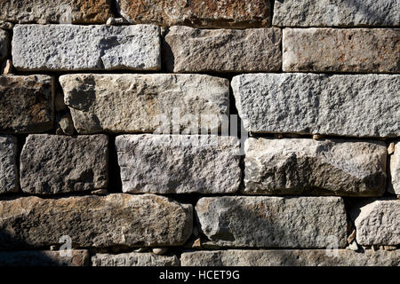 Granite block retaining wall Stock Photo