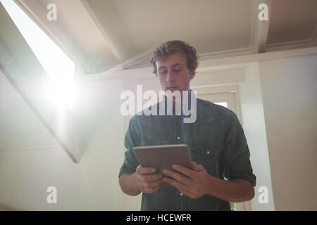 Man holding a digital tablet Stock Photo