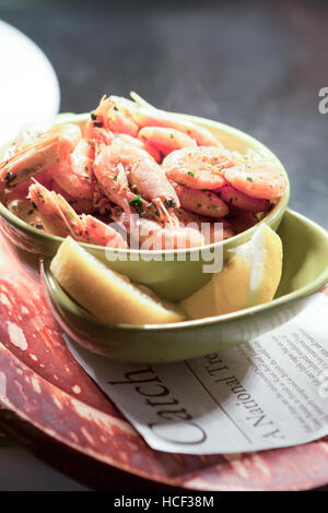 shell on prawns with lemon garlic and parsley, Stock Photo