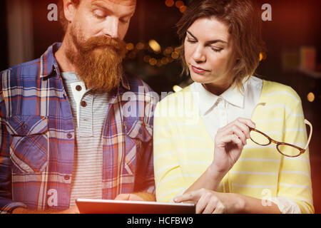 Businessman discussing with colleague Stock Photo