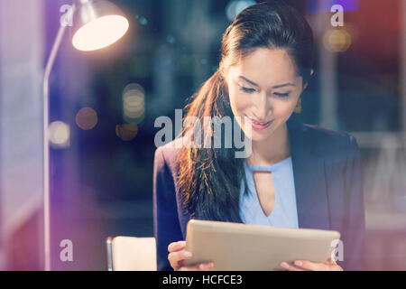 Businesswoman using digital tablet Stock Photo