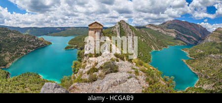 Hermitage of La Pertusa over the Canelles reservoir in La Noguera, Lleida province, Catalonia, Spain Stock Photo