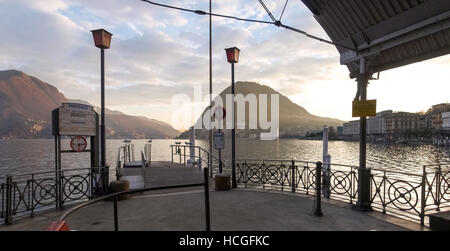 Lugano, Switzerland: gulls resting on the edge of the pier at Lake Lugano Stock Photo