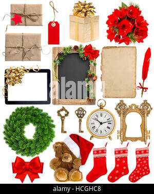 Christmas decoration, ornaments and gifts. Old book page, paper, wreath, blackboard, flowers, wrapped gifts isolated on white background Stock Photo
