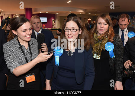 Conservative candidate Dr Caroline Johnson is ushered away from One NK in North Hykeham, Lincolnshire, as the media try to speak to her after winning the by-election triggered by the resignation of Conservative MP Stephen Phillips. Stock Photo