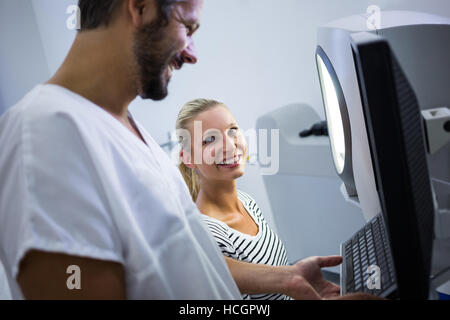 Woman discussing with dermatologist Stock Photo