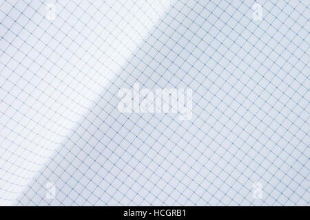 Squared paper close-up background. Diagonal orientation with page curl Stock Photo