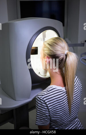 Woman receiving aesthetic laser scan Stock Photo