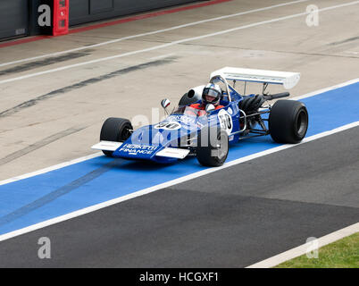 A 1971 March-Cosworth 712M with driver Paul Bason at the 2016 Silverstone Classic Stock Photo
