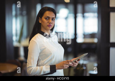Businesswoman using digital tablet Stock Photo
