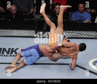 Diego Brandao, left, fights Dennis Bermudez at The Ultimate Fighter 14 Finale at the Palms in Las Vegas, Nevada on Saturday, December 3, 2011. Photo by Francis Specker Stock Photo