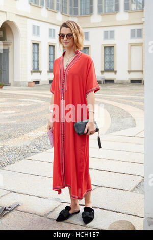 Woman with Black Prada Bag with Golden Logo and White Jacket before  Blumarine Fashion Show, Milan Fashion Editorial Image - Image of elegant,  logo: 194564870