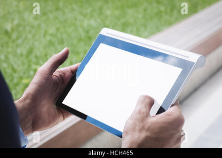 Close-up of a businessman using digital tablet Stock Photo