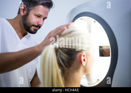 Woman receiving aesthetic laser scan Stock Photo